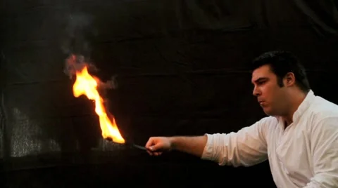 Fire eater closeup Stock Footage 49044696