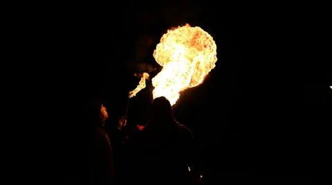 Fire eater in the dark Foto stock