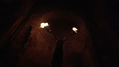 Fire eater makes a fire show 動画素材 230686778