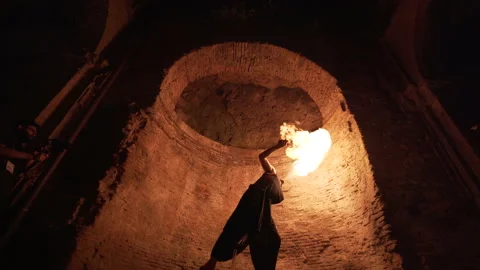 Fire eater makes a fire show 動画素材 230686893