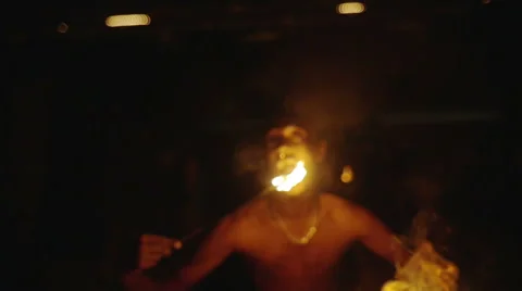 Fire eater performing at night Stock Footage 51879146