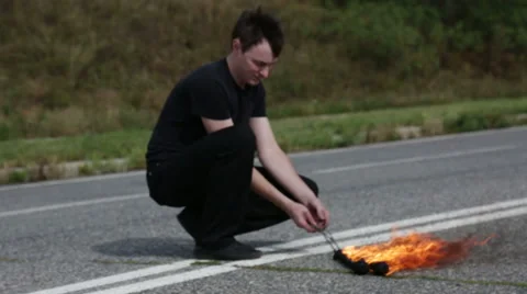 The fire eater, performs the trick Stock Footage 67958315