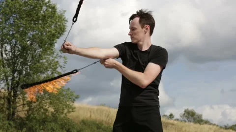 The fire eater, performs the trick Stock Footage 67958333