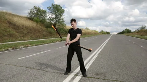 The fire eater, performs the trick Stock Footage 67958430