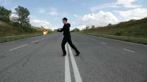 The fire eater, the rotation of fireballs Stock Footage 67958902