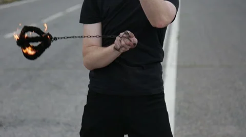 The fire eater, the rotation of fireballs Stock Footage 67958972