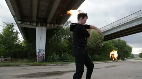 The fire eater, the rotation of fireballs Stock Footage 67959162