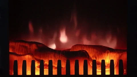 Fire of an electric fireplace - 4K Stock Footage 147441475