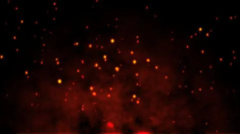 Fire ember particles over black black background Fotos Stock
