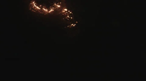Fire embers travel down wire brush HD Video stock 35606385