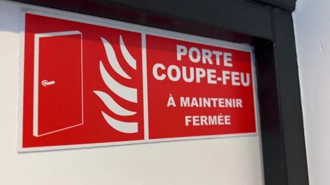 Fire emergency exit door in Paris, France Stock Footage 242370061