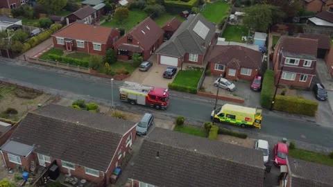 Fire engine and ambulance in urban street setting. Hull.UK 5.7.2025 Stock Footage 317940064