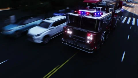 An fire engine, fire rescue driving fast on a city street. Stock Footage 328543695