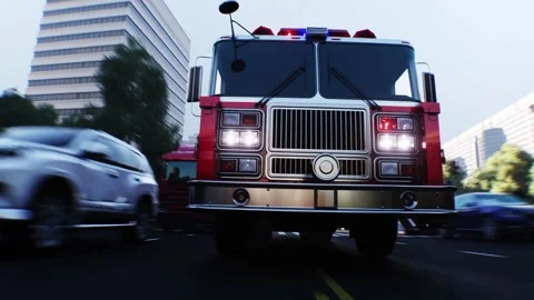 An fire engine, fire rescue driving fast on a city street. Stock Footage 328543879