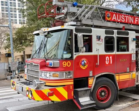 Fire engine with ladder parked outside the first station in Austin, Texas Foto stock