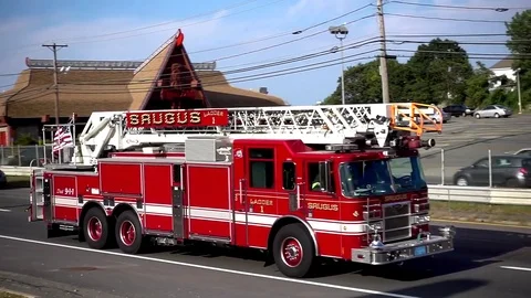 Fire Engine ladder truck, emergency firemen response, highway traffic Video stock 80400096