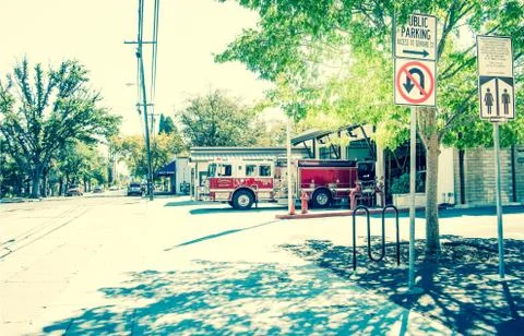 Fire engine leaving fire station Stock Photos