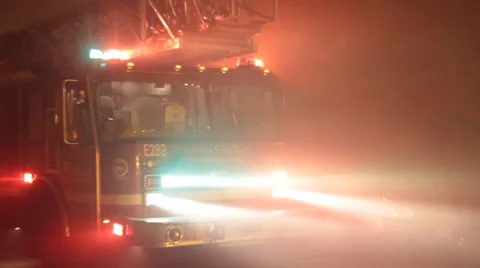Fire engine with lights and heavy smoke Stock Footage 42266572