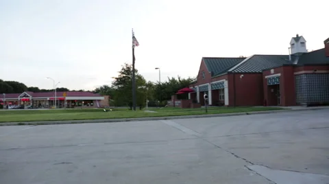 Fire engine with lights on at the fire department, panning Stock Footage 66548770