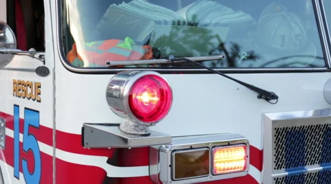 Fire engine with lights on at the fire department, close up Stock Footage 66548775