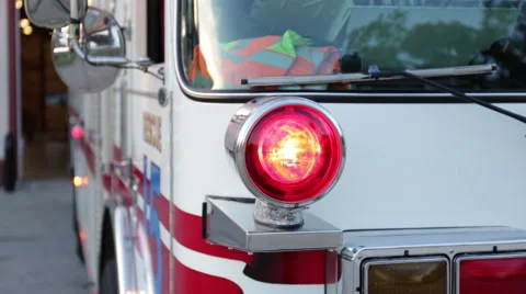 Fire engine with lights on at the fire department, close up Stock Footage 66548868