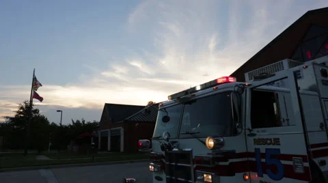 Fire engine lights at sunset Stock Footage 66548707