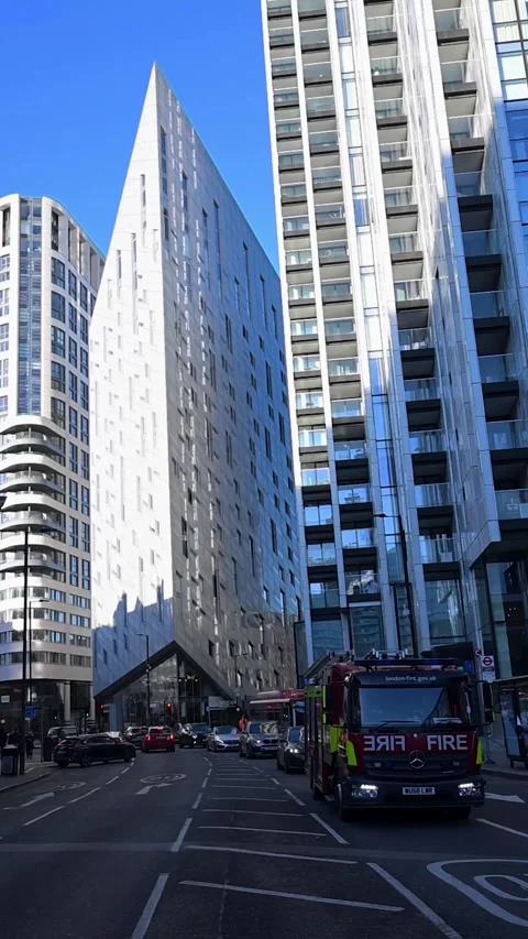 Fire Engine on Old Street London Stock Footage 325952702