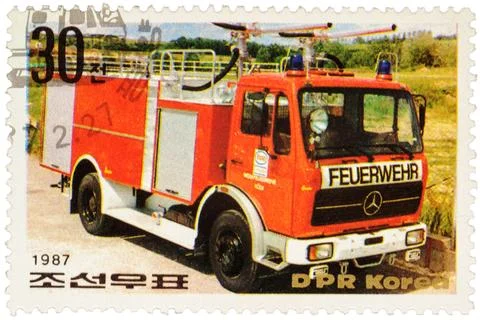 Fire engine on postage stamp Stock Photos