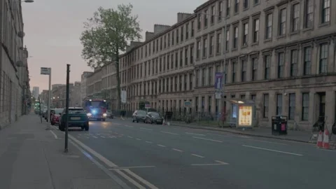 Fire Engine Responding to Emergency Through City Streets Early Sunrise Vídeo Stock 342294435
