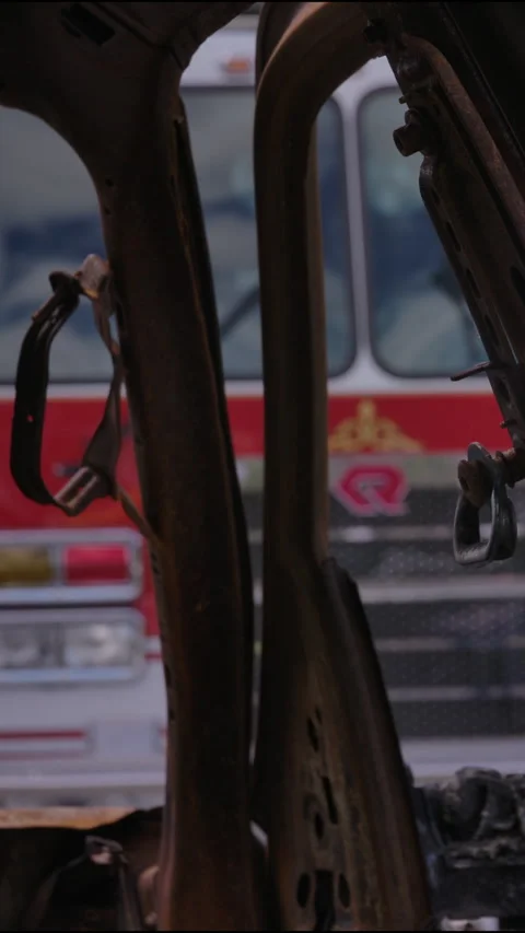 Fire engine on the scene of a burned out car Stock Footage 330892531