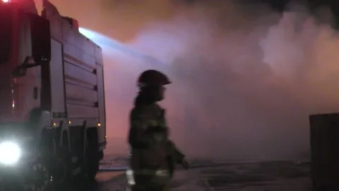 Fire engine sprays huge amount of water on timber fire, pollution 스톡 동영상 184121422