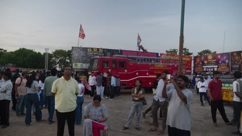 Fire engine stationed on Grand Sataabdi Utsav event with public for safety at Vídeo Stock 341842380