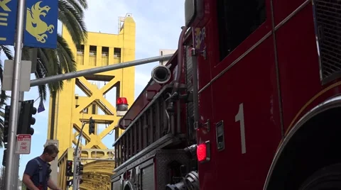 Fire engine , Tower Bridge, flashing light Stock Footage 40613217