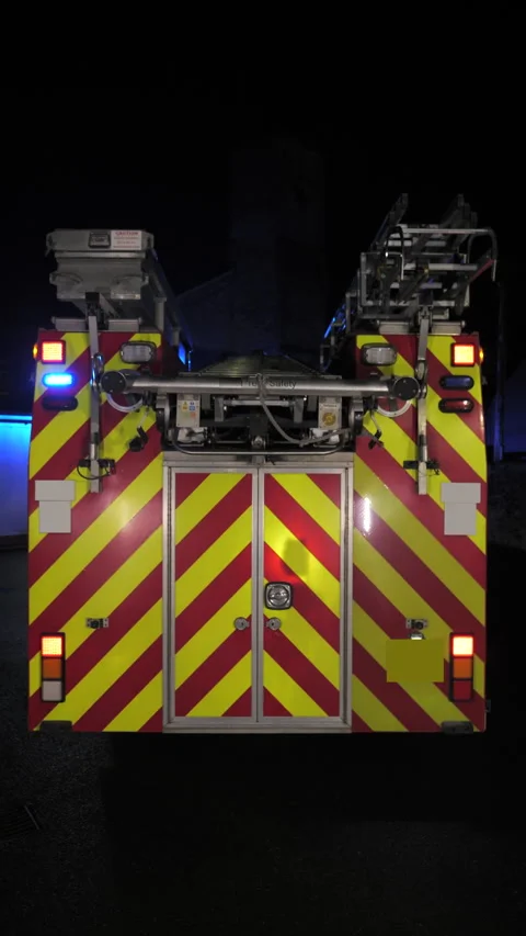 Fire engine truck emergency flashing blue lights. UK. Vertical Stock Footage 330420934