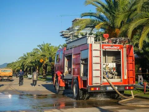 Fire engine at work. Pumps pump water. Fire extinguishing. Fire engine in a.. Stock Photos