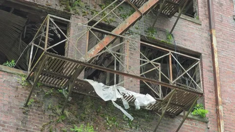Fire escape on an  abandoned Hotel Stock Footage 154184428