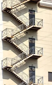 Fire escape from the end of a multi-storey building Stock Photos