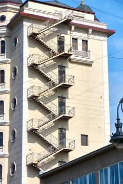 Fire escape from the end of a multi-storey building Stock Photos