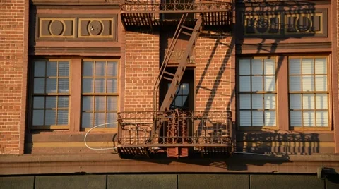 Fire Escape on a red bricked building in California Stock Footage 46256680