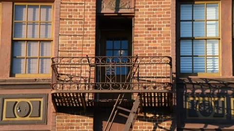 Fire Escape on a red bricked building in California Stock Footage 46256985