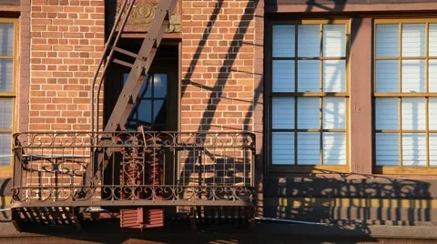 Fire Escape on a red bricked building in California Stock Footage 46257311