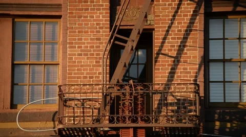 Fire Escape on a red bricked building in California Stock Footage 46257500