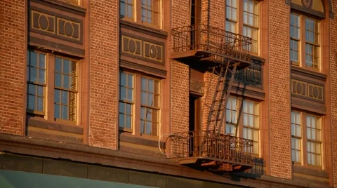 Fire Escape on a red bricked building in California Stock Footage 46257506