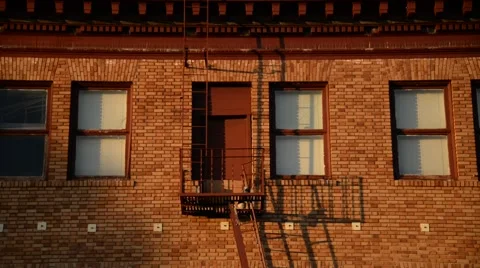 Fire Escape on a red bricked building in California Stock Footage 46257744