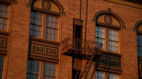 Fire Escape on a red bricked building in California Stock Footage 46258049
