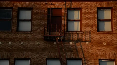 Fire Escape on a red bricked building in California Stock Footage 46258979