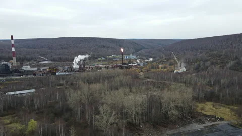 Fire escapes from a pipe at the factory Stock Footage 141754273
