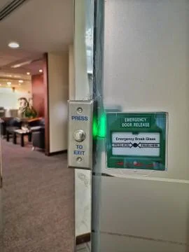 Fire exit button escape button in situation Stock Photos