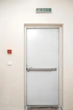 Fire exit door in condominium or apartment for emergency fire alarm Isolated  Stock Photos