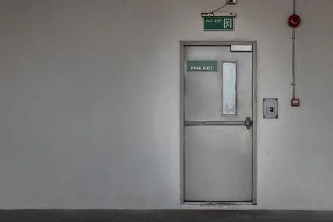 Fire exit door for emergency case with alarm for safety protection. Stock Photos
